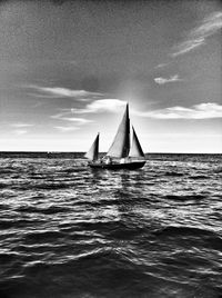 Boat sailing in sea