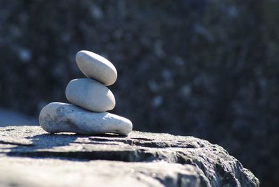 Close-up of stone stack on rock