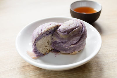 Close-up of breakfast served in plate on table