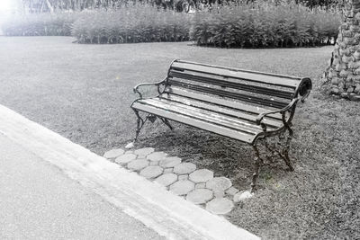 High angle view of bench in park
