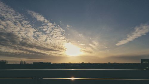 Road against sky during sunset