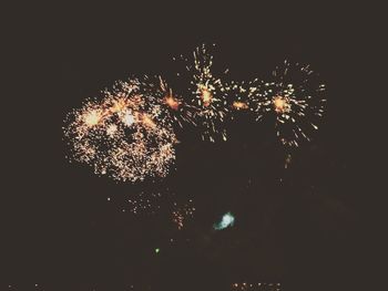 Firework display at night