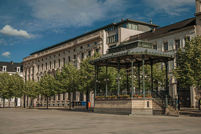 Square with gazebo and ancient buildings in ghent. a city with gothic buildings in belgium.