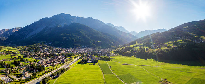 Panoramic view of townscape against mountains