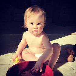 Portrait of cute girl playing