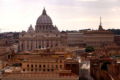 View of buildings in city against sky