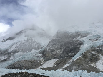 Scenic view of mountains against sky during winter