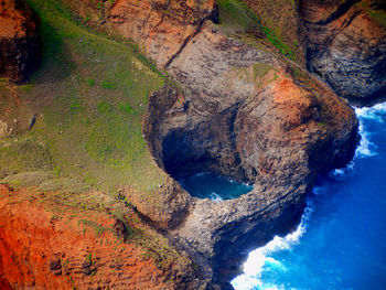 High angle view of rock formation in sea