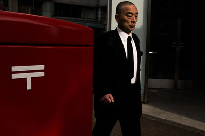 Full length of a man standing at night