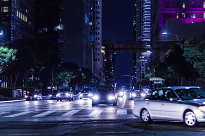 Cars on road at night