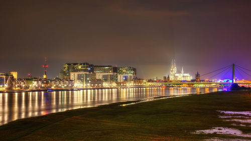 Illuminated buildings at waterfront