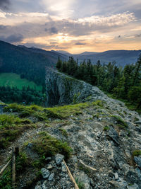 Scenic view of stream against sky during sunset