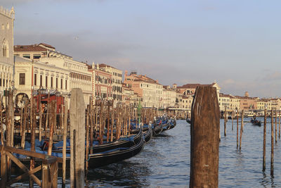  view of gondolas moored in venice