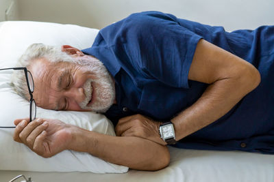 Man sleeping on bed