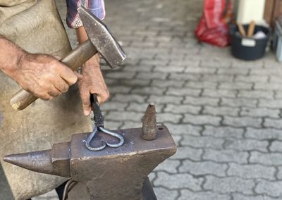 Cropped image of man working in workshop