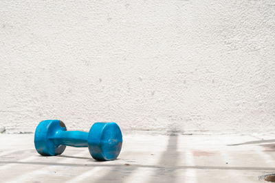 High angle view of dumbbells on floor