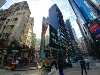 People walking on road in city