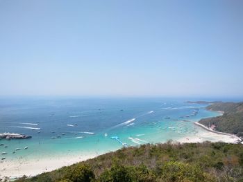 Scenic view of sea against clear blue sky