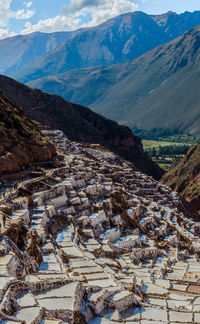 Aerial view of snowcapped mountains against sky