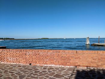 View of blue sea against clear sky