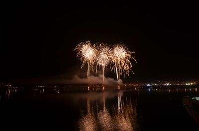 Firework display at night