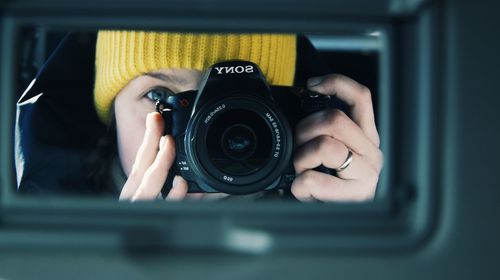 Midsection of person photographing