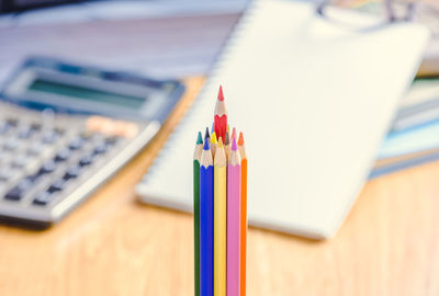 High angle view of colored pencils on table