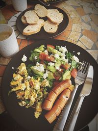 High angle view of breakfast served on table