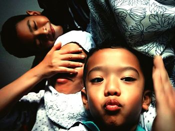 Portrait of mother and daughter at home