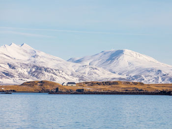 Scenic view of snowcapped mountains against sky, from reykjavik