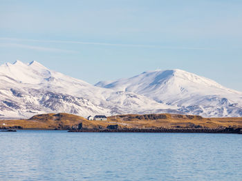 Scenic view of snowcapped mountains against sky