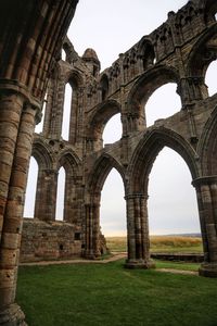 Low angle view of old ruins against clear sky