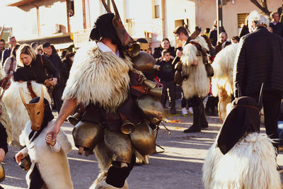 Group of people on street in city