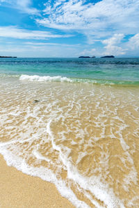 Scenic view of beach against sky