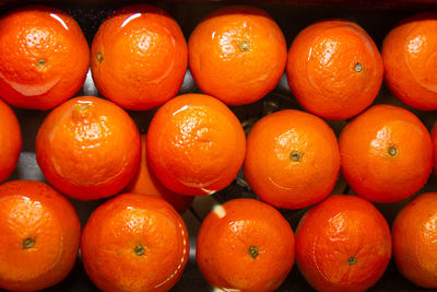 Full frame shot of oranges in market