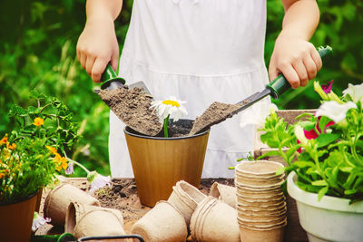 Midsection of man gardening