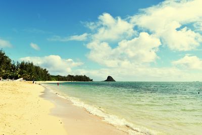 Scenic view of beach against sky