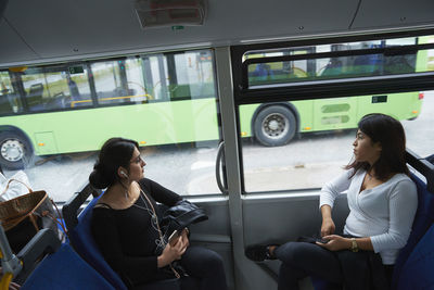 Women sitting in bus