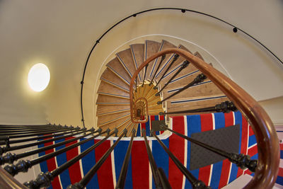 Low angle view of spiral staircase in building