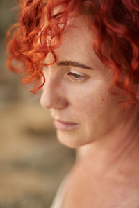 Close-up of woman looking away