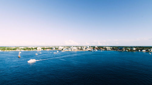 Scenic view of sea against blue sky