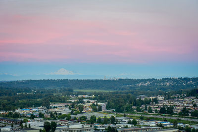 High angle view of townscape against sky at sunset