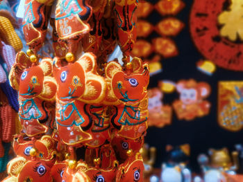 Close-up of toys for sale at market stall