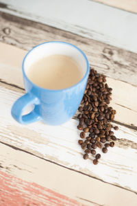 High angle view of coffee cup on table