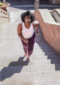 Full length of woman on staircase