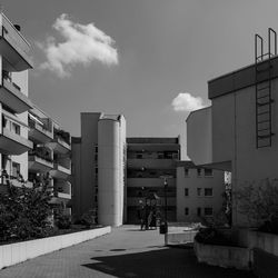 Buildings in city against sky