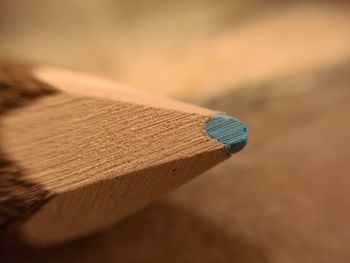 Close-up of colored pencil on table