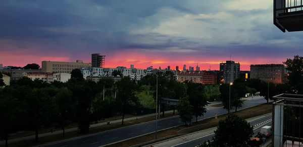 High angle view of buildings against sky during sunset