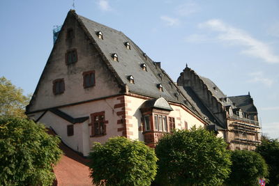 Low angle view of old building against sky