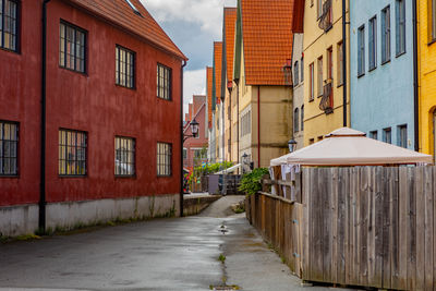 Street amidst houses